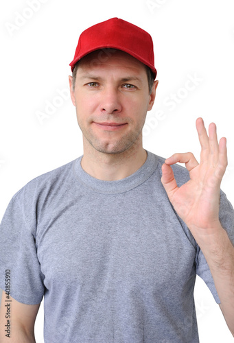 Photo: Feeling good working man in a red cap Feeling good working man in a red cap