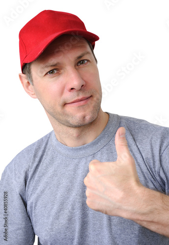 Photo: Feeling good working man in a red cap Feeling good working man in a red cap
