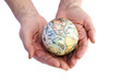 isolated earth globe  in the old woman hands