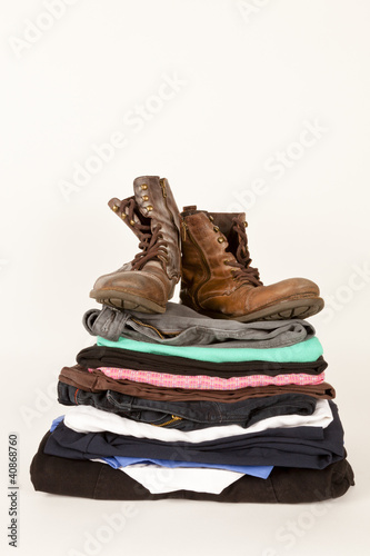 Photo: Old Clothes And A Pair Of Boots For Charity Or Jumble Sale Old Clothes And A Pair Of Boots For Charity Or Jumble Sale