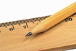 Macro image wooden pencil and ruler on white background
