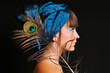 Photo: Young woman in blue turban with peacock feather Young woman in blue turban with peacock feather