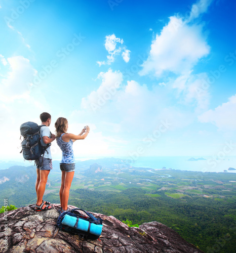 Photo: Backpacker on a rock Backpacker on a rock