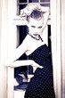 Attractive retro woman in old house