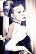 Attractive retro woman in old house