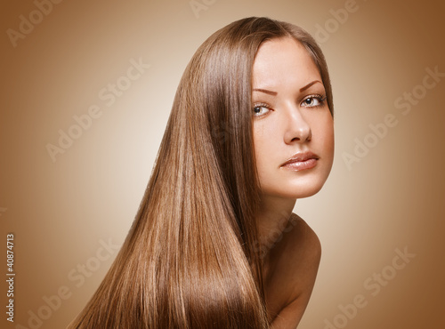 Photo: woman with elegant long shiny hair woman with elegant long shiny hair