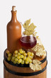 Still life with wine bottles, glasses and oak barrels Still life with wine bottles, glasses and oak barrels