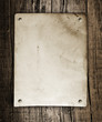 Old vintage poster on wooden background