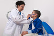 Photo: Doctor applying oxygen treatment on a little boy with asthma. Doctor applying oxygen treatment on a little boy with asthma.