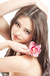 beautiful girl with orchid on white background