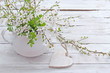 spring blossom and heart on wood background spring blossom and heart on wood background