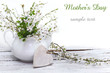 Card of spring blossom and heart on wood background Card of spring blossom and heart on wood background