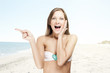 happy girl in a swimsuit , on the beach