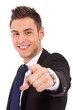 young business man pointing