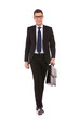 young business man carrying a suitcase, walking young business man carrying a suitcase, walking