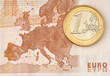 One Euro Coin on Euro Banknote showing Map of Europe