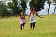 mother and daughter running