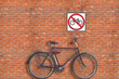 Sign. Brick wall and bicycle