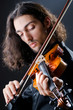 Violin player playing the intstrument Violin player playing the intstrument