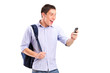 A portrait of a smiling young man looking at a cell phone