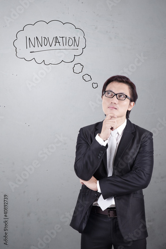 Photo: Businessman thinking about innovation Businessman thinking about innovation