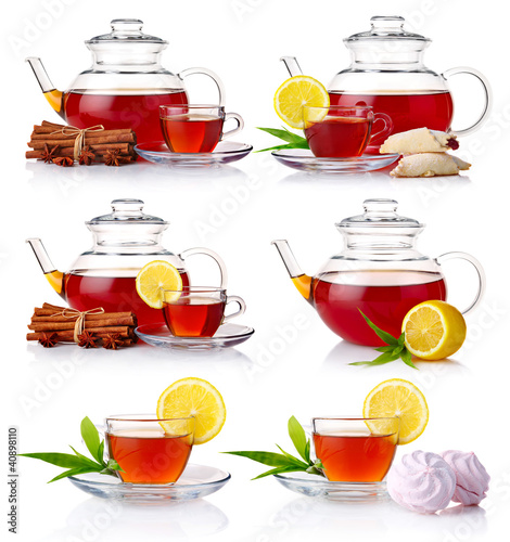 Photo: Set of teapot with black tea isolated on white Set of teapot with black tea isolated on white