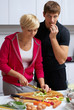 lovely couple making a salad