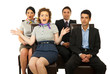 Amazed business people on chairs