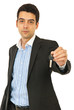Business man giving house key