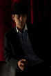 Elegant gentleman in darkness