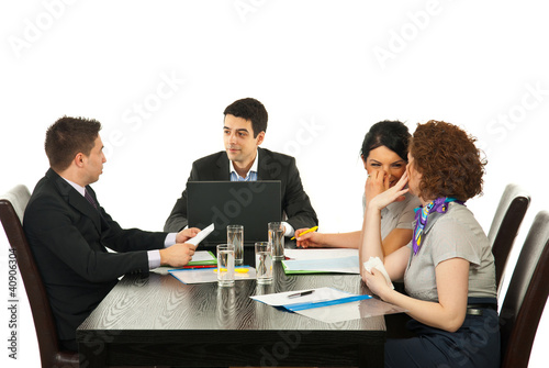 Photo: Business people talking at meeting Business people talking at meeting