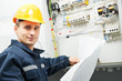 Foto: Electrician checking cabling power line Electrician checking cabling power line