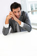 Businessman sitting a his desk for meeting