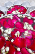 Rose petals and jasmine flowers floating on the water. Rose petals and jasmine flowers floating on the water.