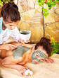 Woman having clay facial mask. Woman having clay facial mask.