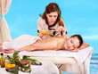 Woman getting spa treatment outdoor. Woman getting spa treatment outdoor.