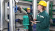 Industrial workers in power plant