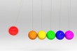 red ball collid with other colorful ball