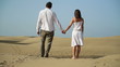 Young couple standing in the desert