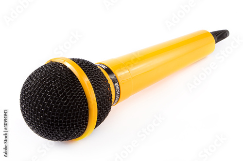 Photo: Yellow microphone over white Yellow microphone over white