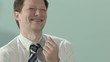 Happy businessman laughing and enjoying good news. Copy space