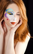 Beautiful redhead girl with make-up.