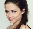 Beautiful young woman face with natural makeup looking isolated Beautiful young woman face with natural makeup looking isolated