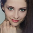 Closeup portrait of sexy young beautiful woman with hand near th Closeup portrait of sexy young beautiful woman with hand near th