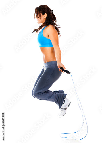 Photo: Woman jumping rope Woman jumping rope