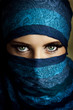 Young arabian woman in hijab with sexy blue eyes