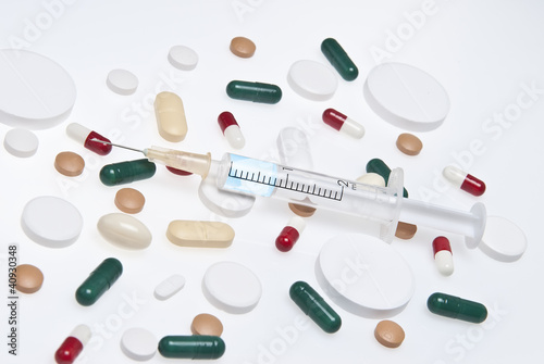 Photo: Fondo con diferentes medicamentos. Fondo con diferentes medicamentos.