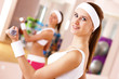 Young woman doing sport in gym