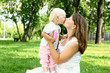 Mother with her daughter outdoors
