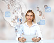 Business person against technology background